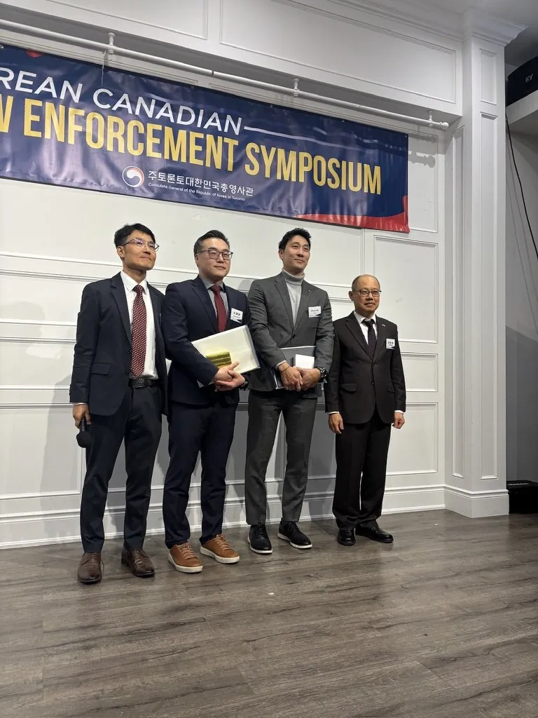 Jae Cho with others at the Korean Canadian Law Enforcement Symposium